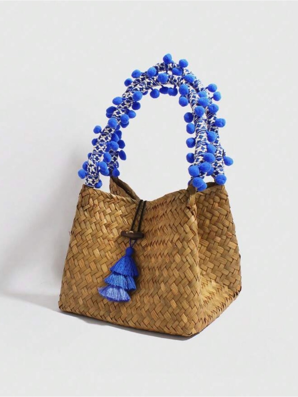 Woven Straw Tote Bag with Blue Pom-Pom Handles